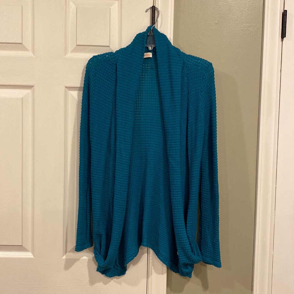 Blue cardigan with pocket detail